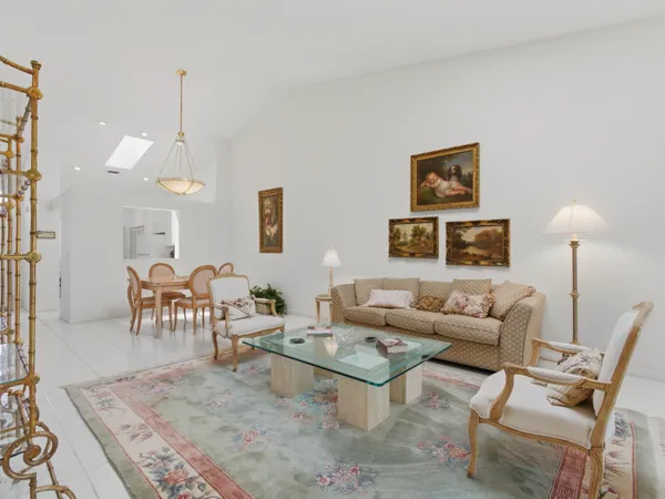 a living room with furniture and a table