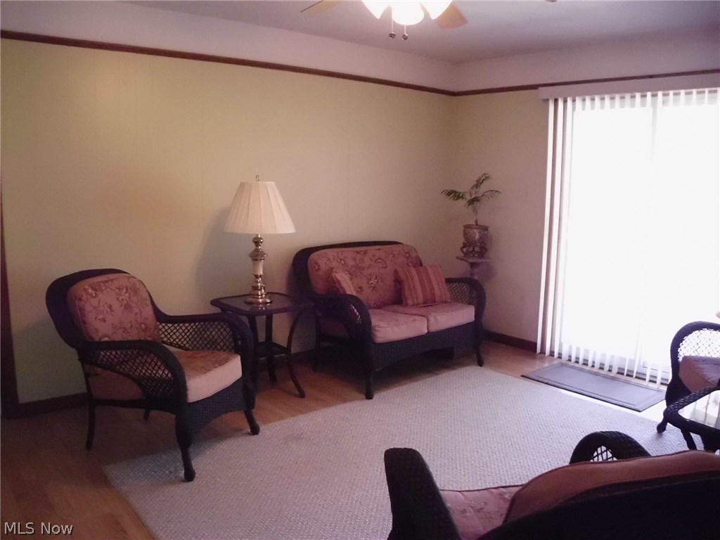 180 Winchester Road Akron, OH 44333 - Photo 4 of 19 Family room view 2 with patio doors leading to covered patio