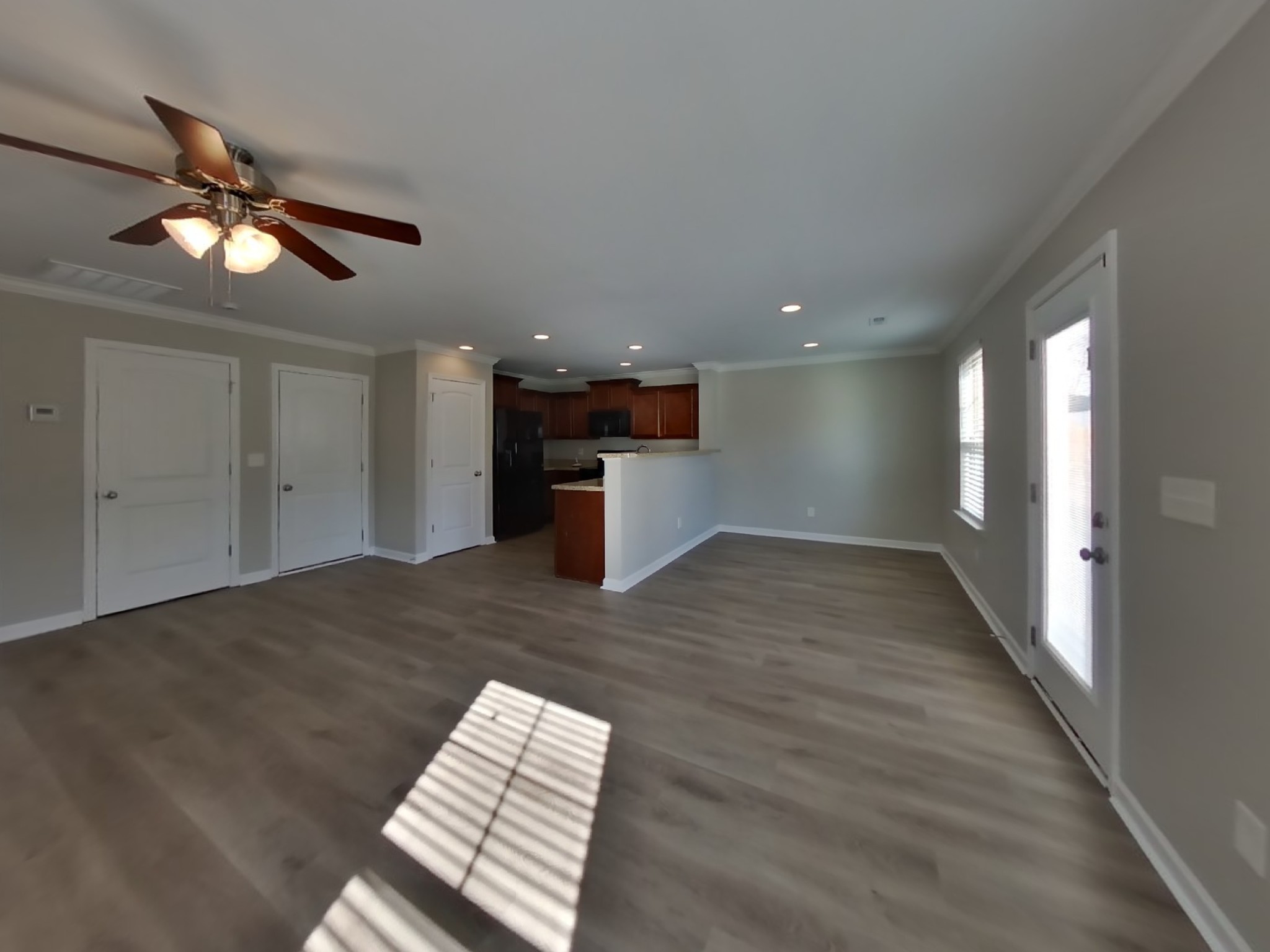 7100 Colquitt Way Fairview, TN 37062 - Photo 3 of 15 a view of an empty room and a kitchen