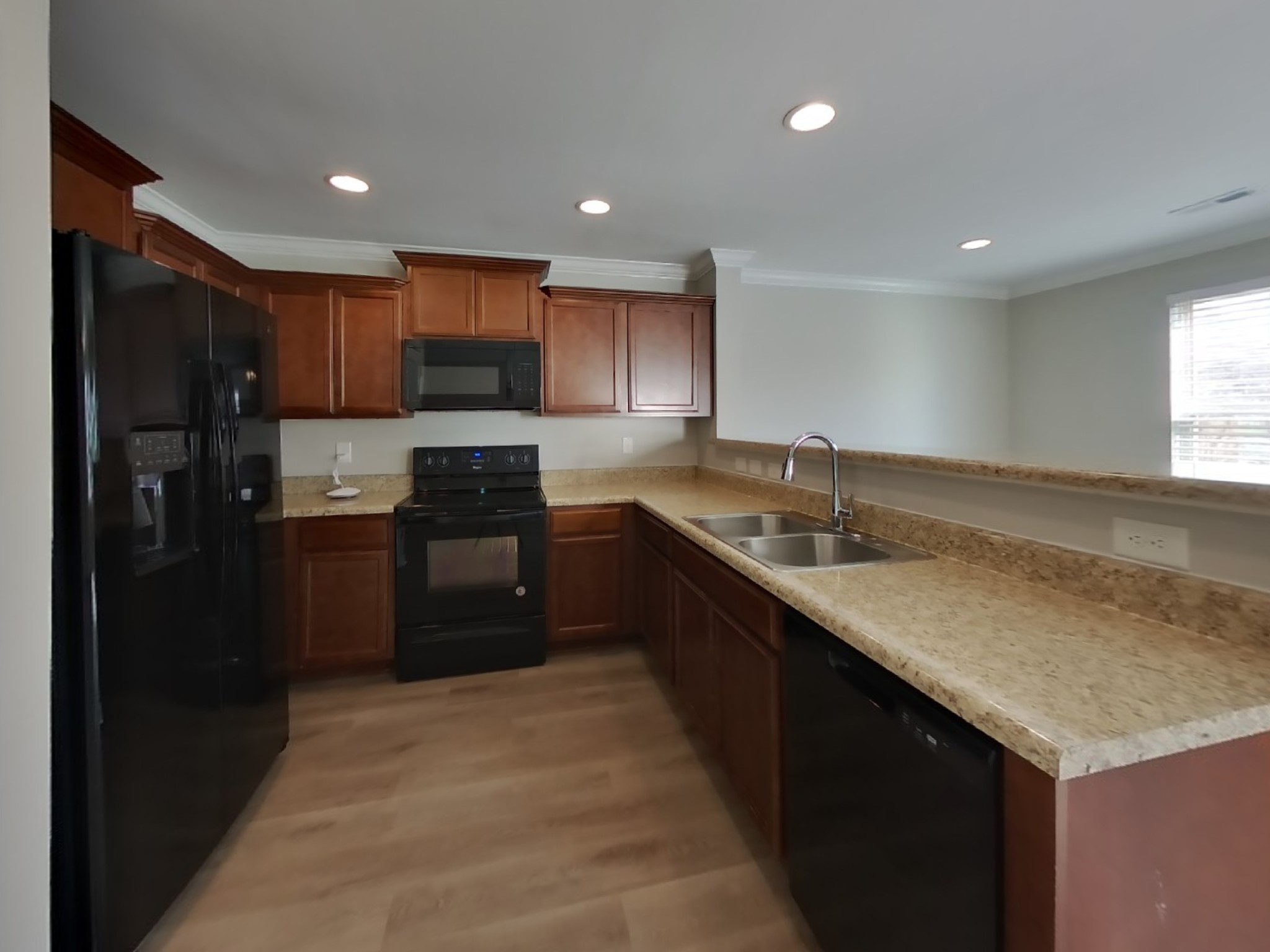7100 Colquitt Way Fairview, TN 37062 - Photo 6 of 15 a kitchen with stainless steel appliances granite countertop a refrigerator a sink and a stove