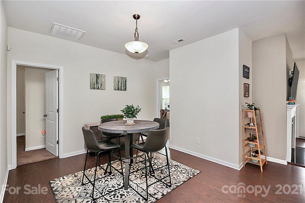 7131 Chrysanthemum Road Lancaster, SC 29720 - Photo 14 of 33 a view of a dining room with furniture