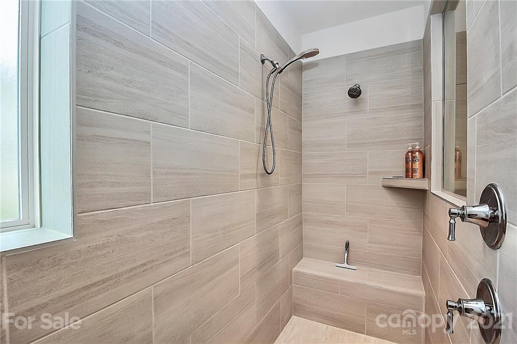 7131 Chrysanthemum Road Lancaster, SC 29720 - Photo 19 of 33 a bathroom with a bathtub and shower