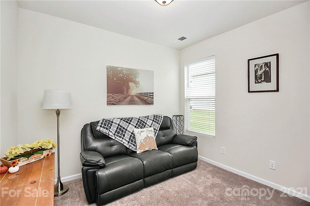 7131 Chrysanthemum Road Lancaster, SC 29720 - Photo 21 of 33 a living room with furniture and a couch