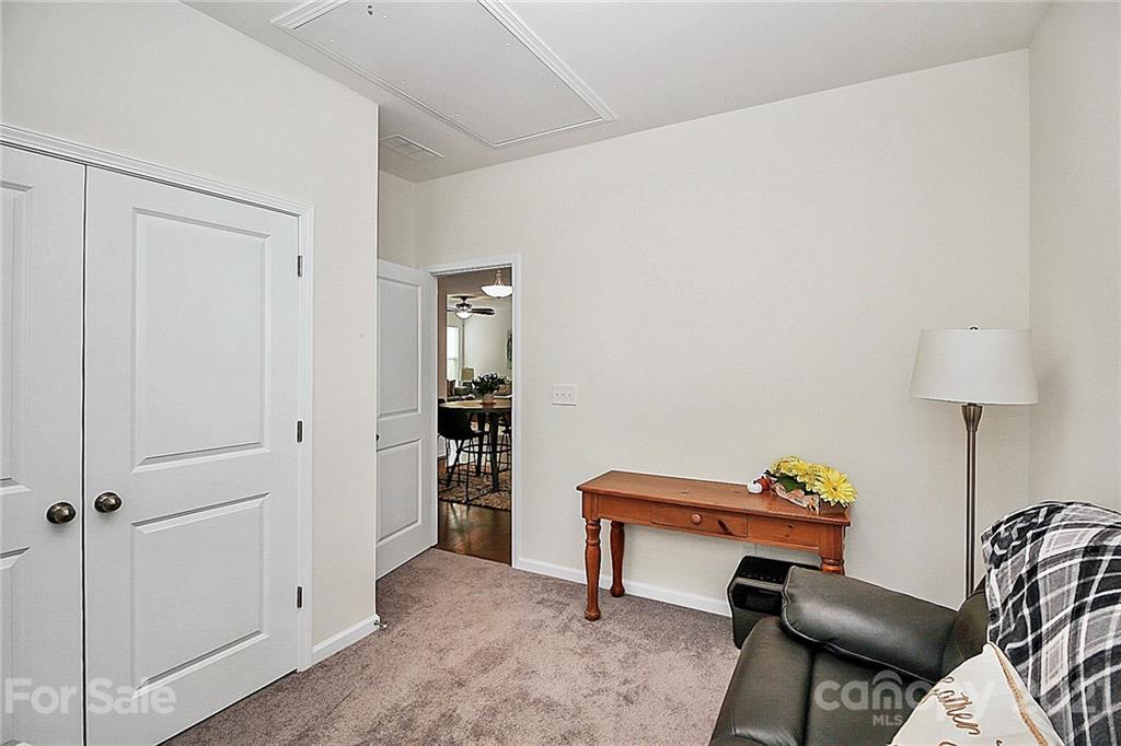 7131 Chrysanthemum Road Lancaster, SC 29720 - Photo 22 of 33 a room with furniture and a potted plant