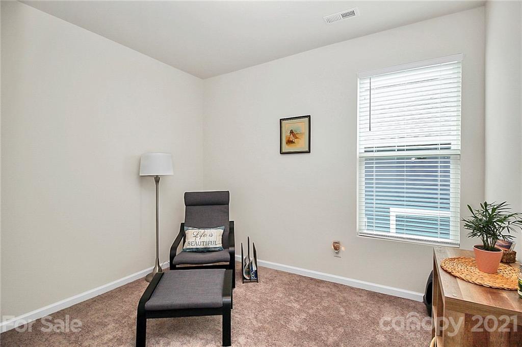 7131 Chrysanthemum Road Lancaster, SC 29720 - Photo 26 of 33 a room with chair and window