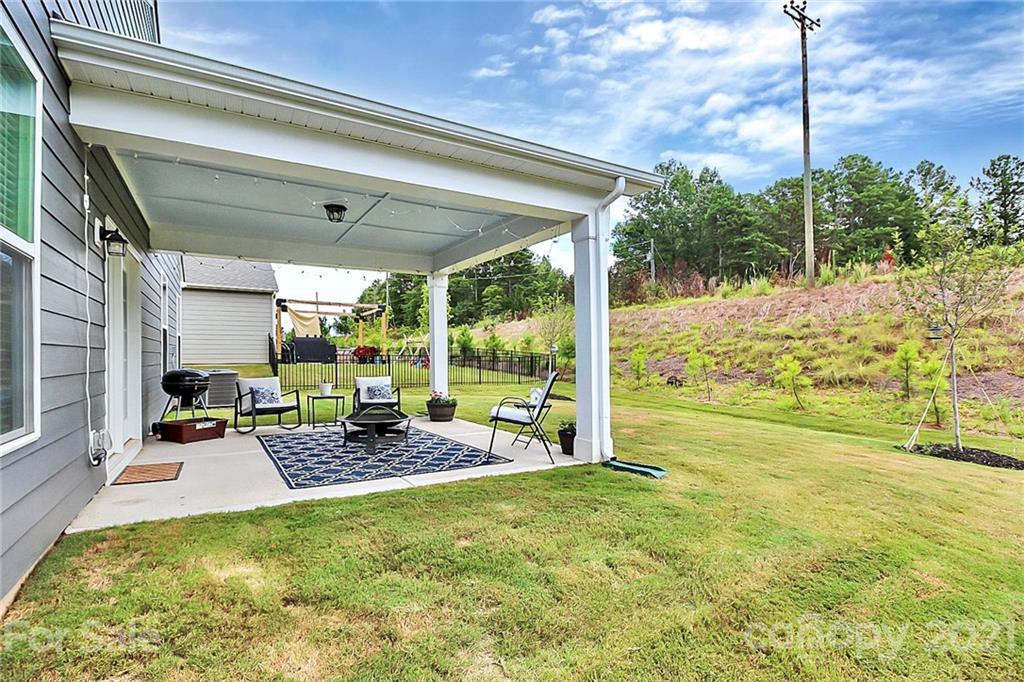 7131 Chrysanthemum Road Lancaster, SC 29720 - Photo 29 of 33 a view of a swimming pool with a patio