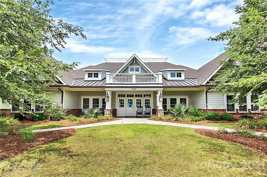 7131 Chrysanthemum Road Lancaster, SC 29720 - Photo 31 of 33 a front view of a house with swimming pool and outdoor seating