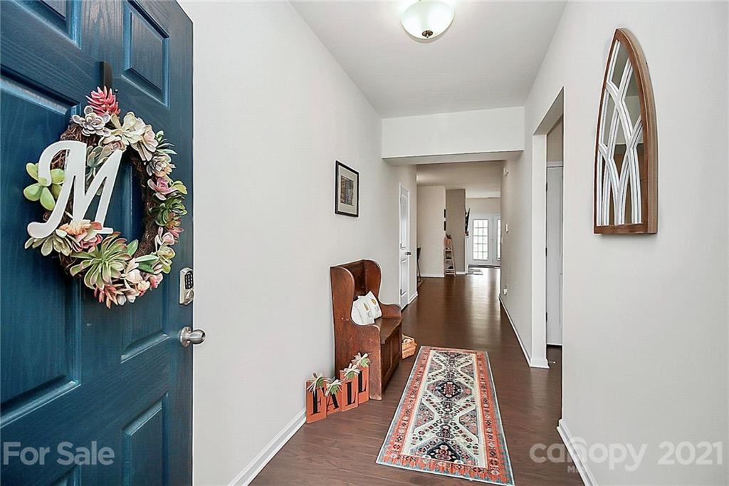 7131 Chrysanthemum Road Lancaster, SC 29720 - Photo 5 of 33 a view of hallway with wooden floor