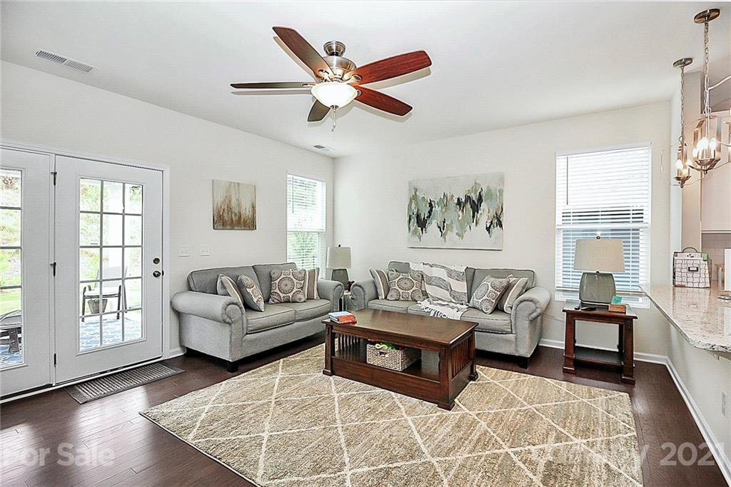 7131 Chrysanthemum Road Lancaster, SC 29720 - Photo 7 of 33 a living room with furniture and a large window