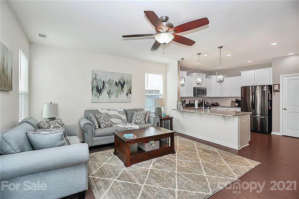7131 Chrysanthemum Road Lancaster, SC 29720 - Photo 8 of 33 a living room with furniture and kitchen view