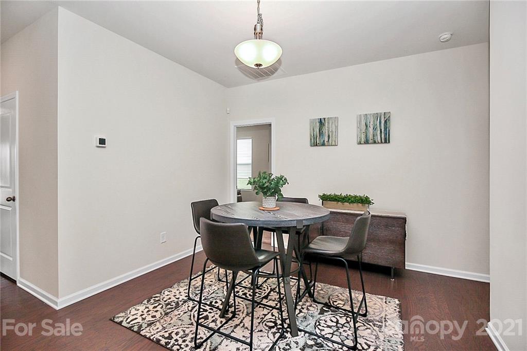 7131 Chrysanthemum Road Lancaster, SC 29720 - Photo 10 of 33 a view of a dining room with furniture