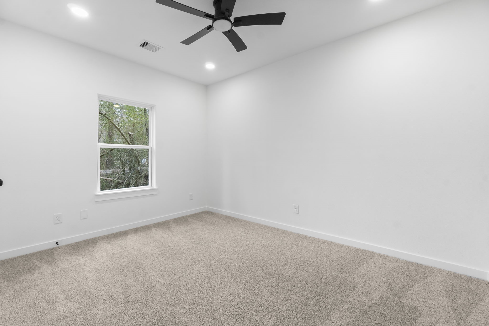 241 Clear Springs Trinity, TX 75862 - Photo 27 of 46 an empty room with a window
