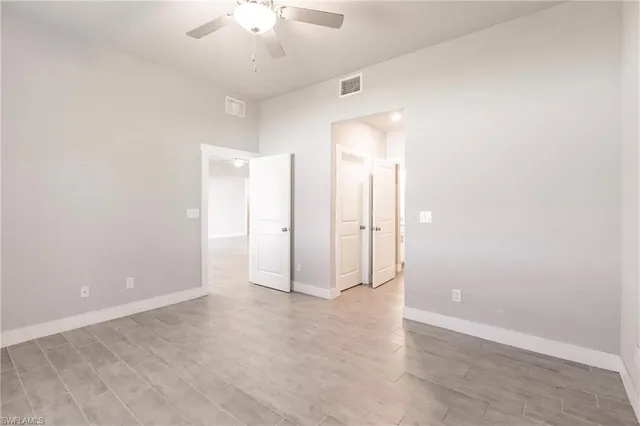 an empty room with a bathroom