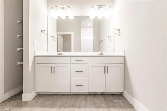 a view of cabinets with wooden floor