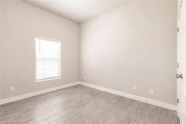 an empty room with a window