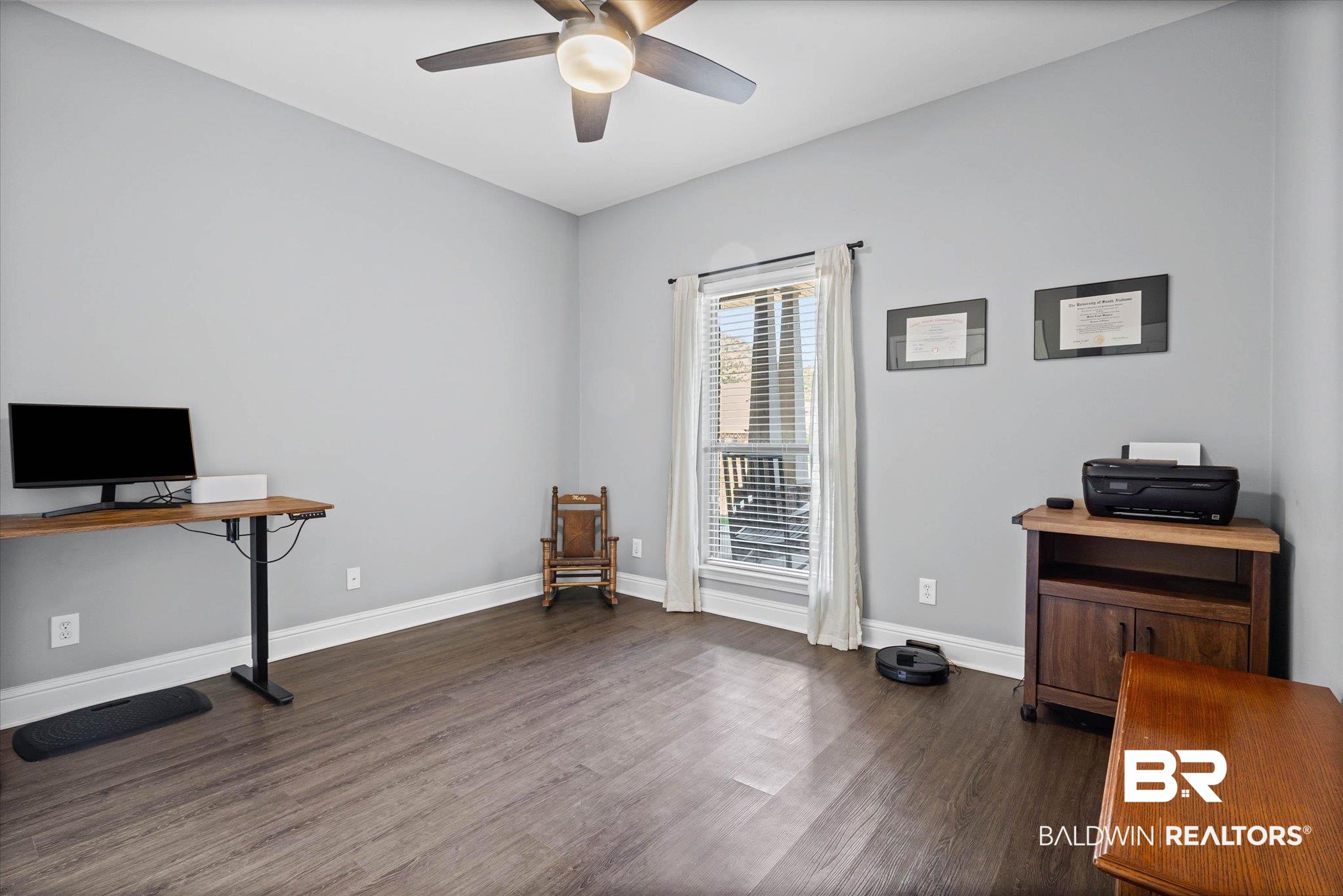 3739 Whitestone Drive Semmes, AL 36575 - Photo 16 of 25 Room featuring wood-finish flooring, a ceiling fan with integrated lighting, and a window with blinds