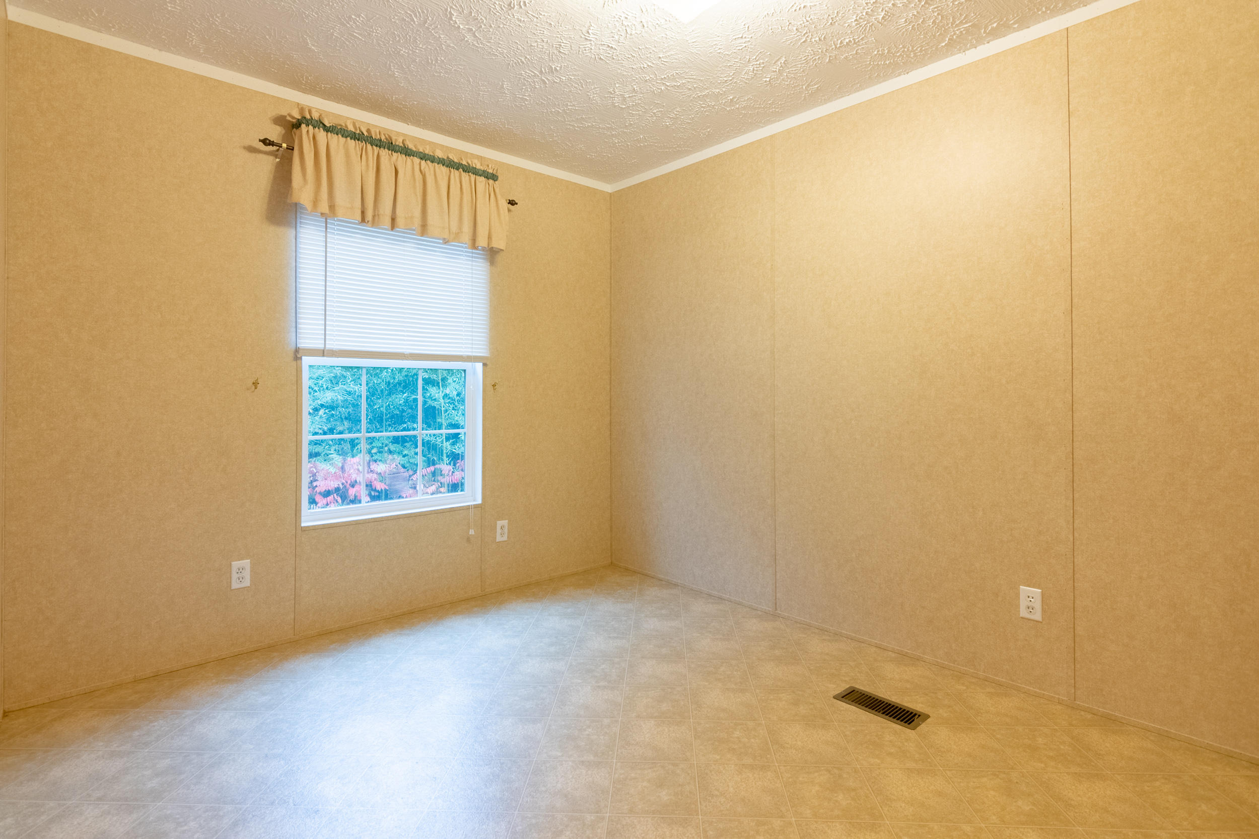 127 Millimeter Road Southwest Floyd, VA 24091 - Photo 18 of 31 an empty room with windows