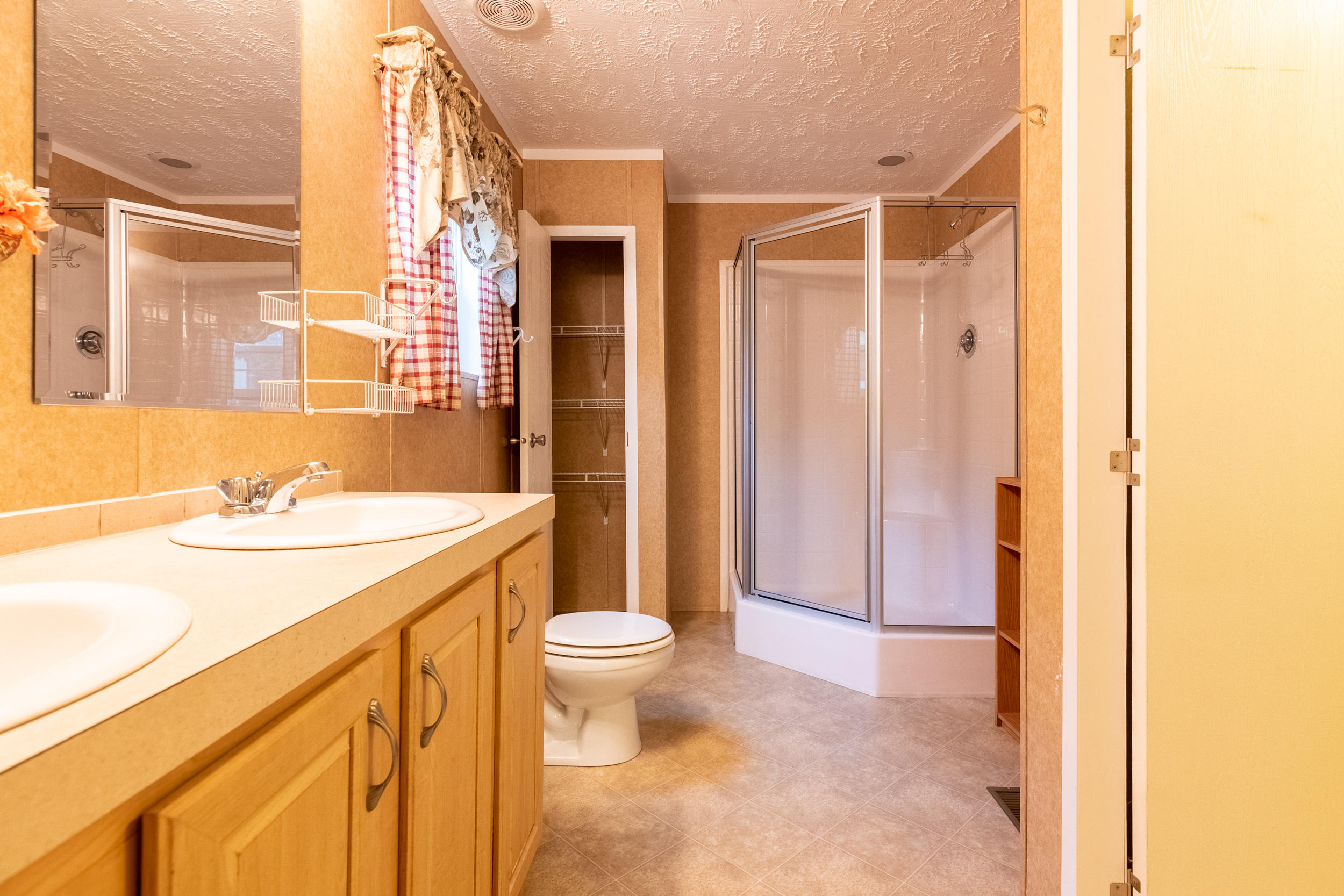 127 Millimeter Road Southwest Floyd, VA 24091 - Photo 23 of 31 a bathroom with a sink a toilet and shower
