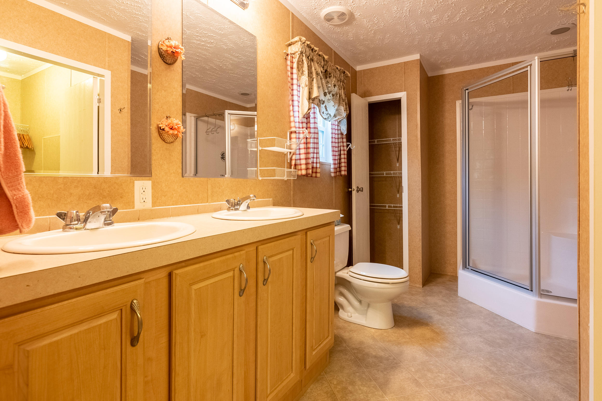 127 Millimeter Road Southwest Floyd, VA 24091 - Photo 24 of 31 a bathroom with a sink a toilet and a shower