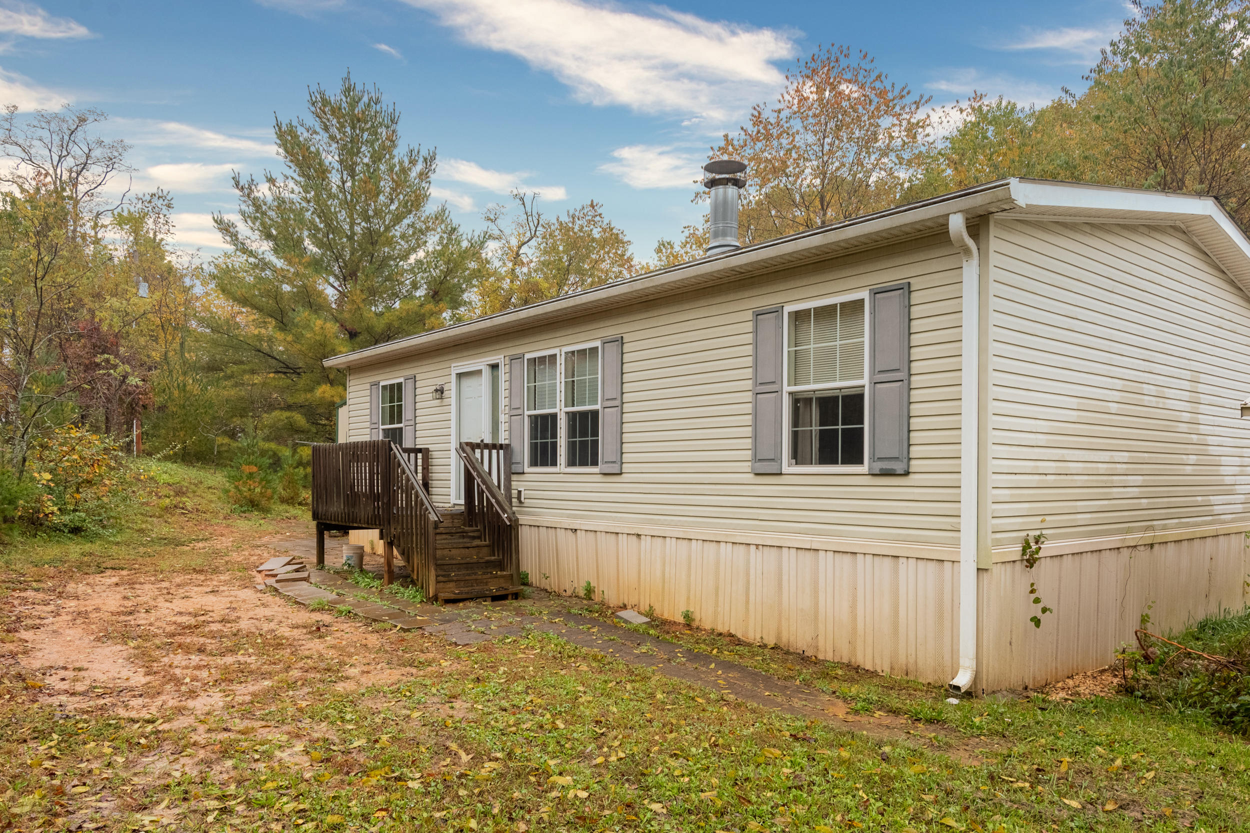 127 Millimeter Road Southwest Floyd, VA 24091 - Photo 27 of 31 a view of a house with backyard and sitting area