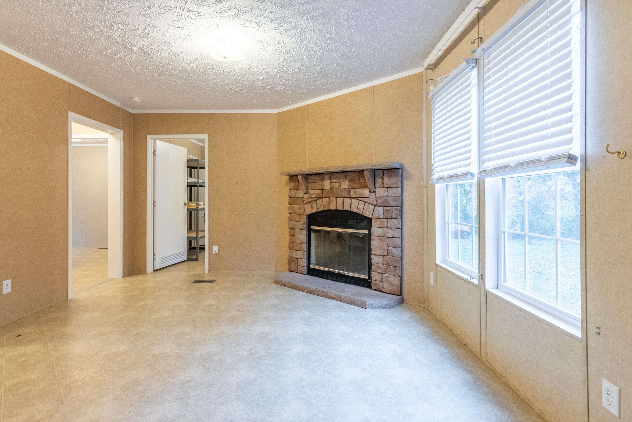 127 Millimeter Road Southwest Floyd, VA 24091 - Photo 6 of 31 a view of empty room with a fireplace