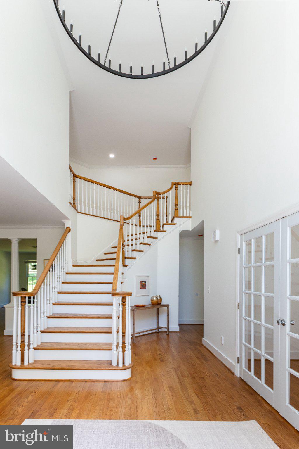 7009 Persimmon Tree Road Bethesda, MD 20817 - Photo 21 of 63 Front Staircase to Upper Level