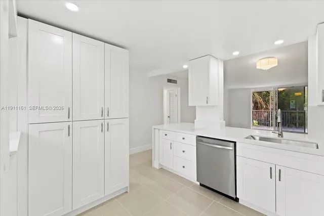 a view of a sink and a mirror