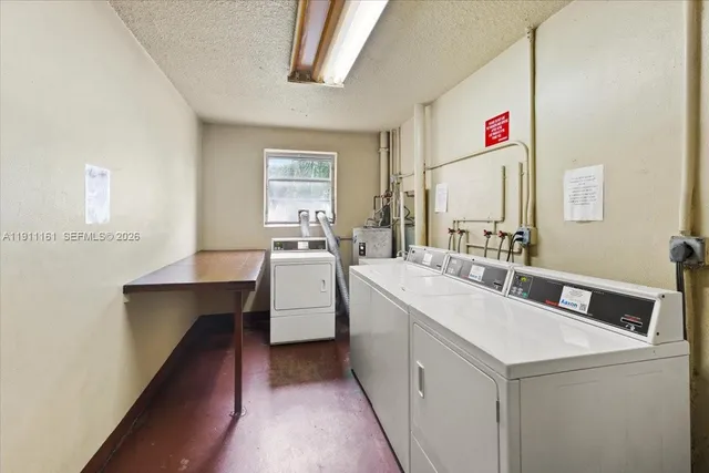 a view of a swimming pool with a lawn chairs