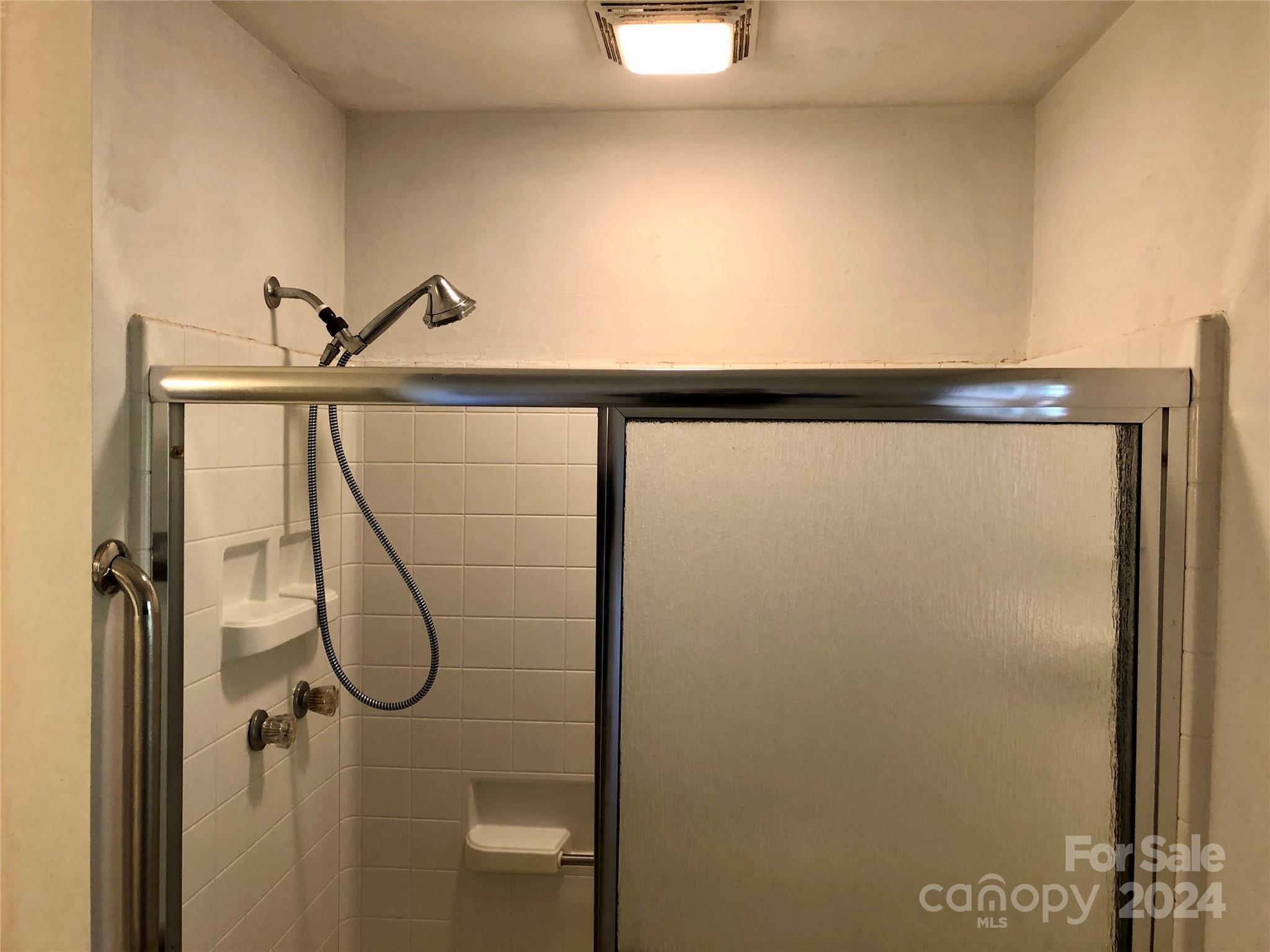 158 Crestview Street Rutherfordton, NC 28139 - Photo 14 of 34 a bathroom with a shower