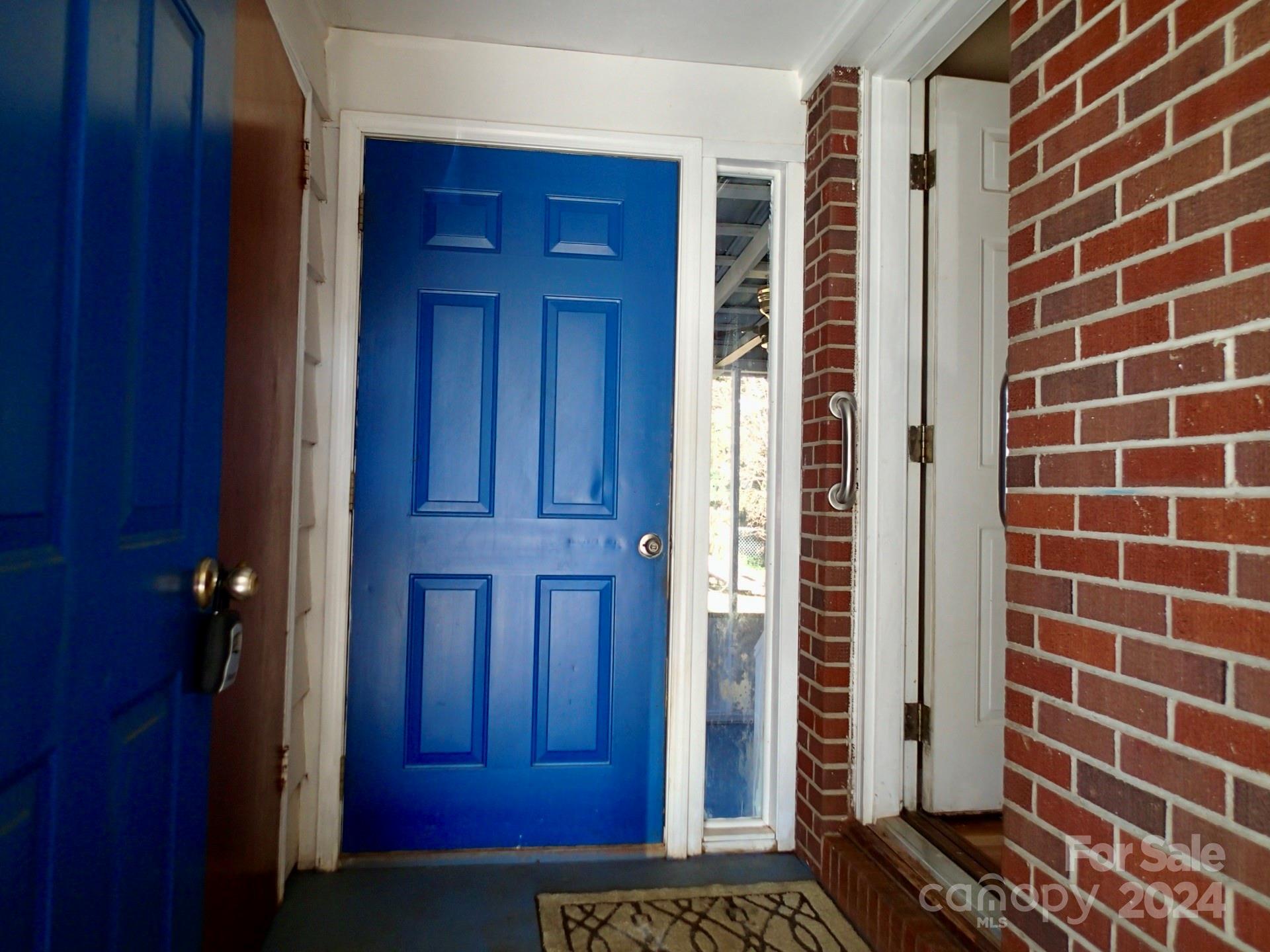 158 Crestview Street Rutherfordton, NC 28139 - Photo 25 of 34 a view of a wooden door and a door