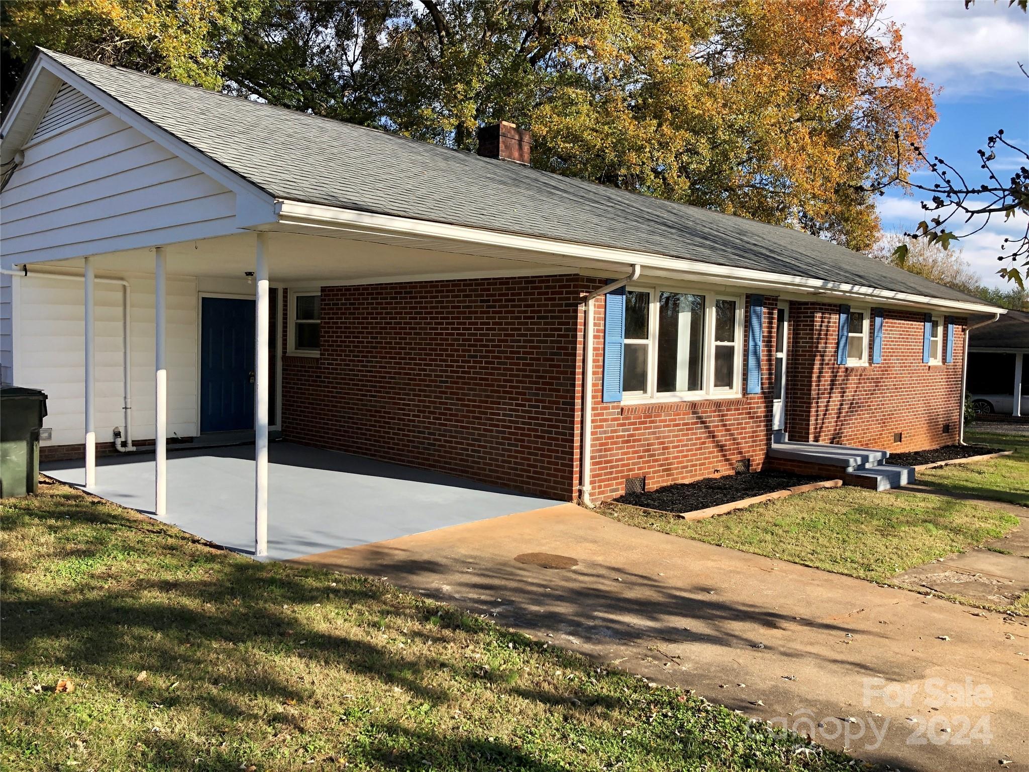 158 Crestview Street Rutherfordton, NC 28139 - Photo 3 of 34 a view of a house with backyard and sitting area