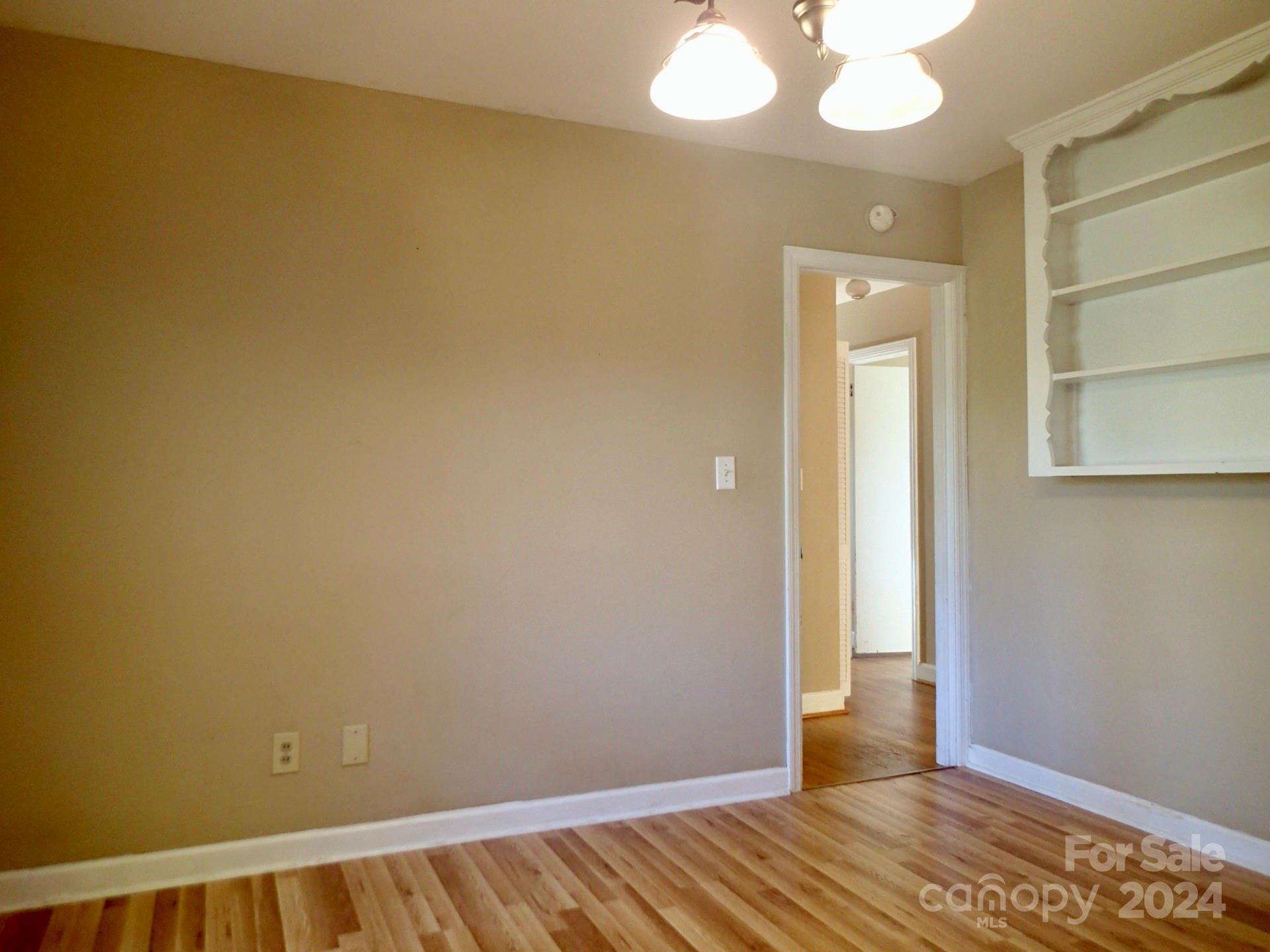 158 Crestview Street Rutherfordton, NC 28139 - Photo 10 of 34 a view of a room with wooden floor and closet