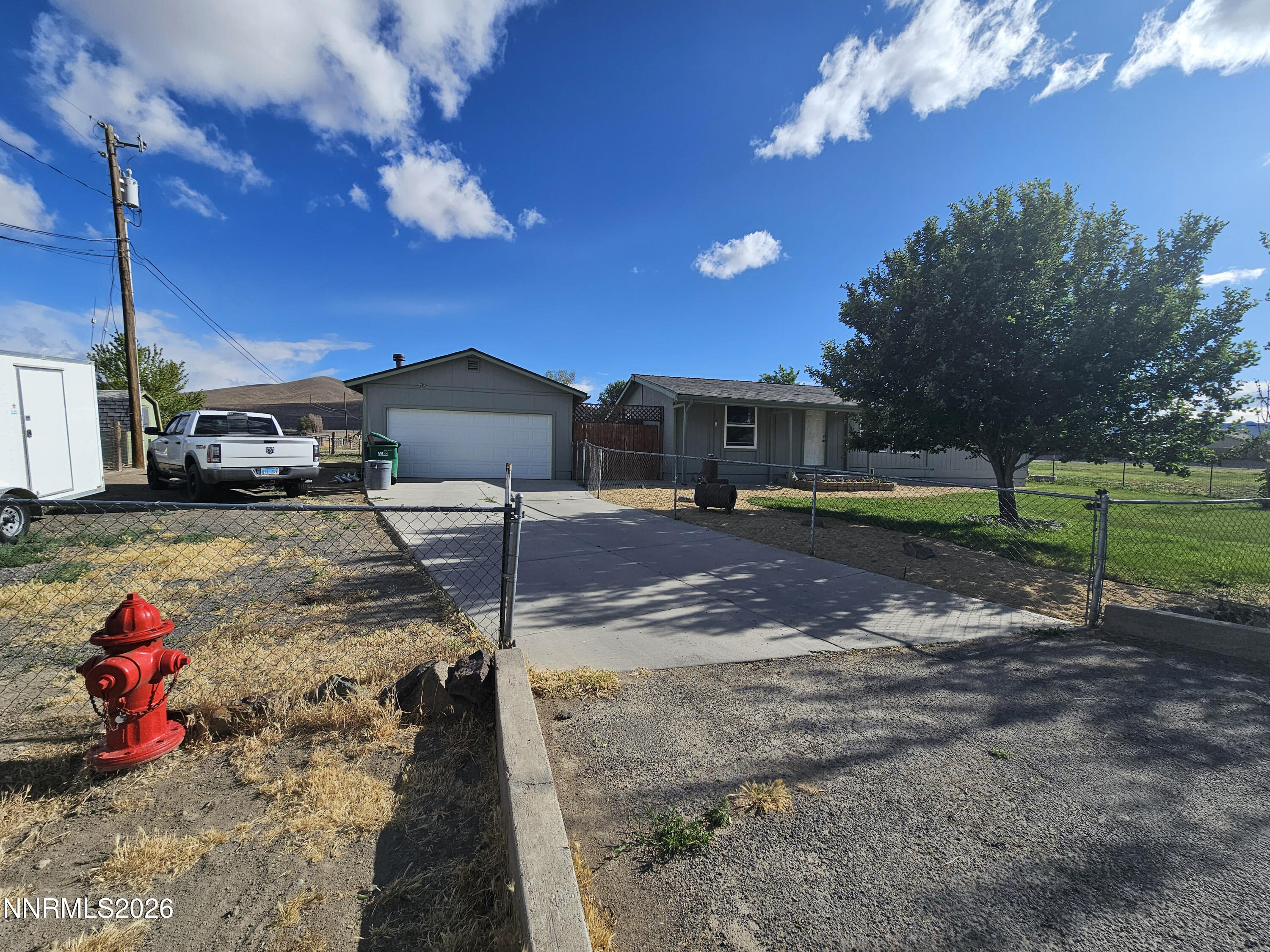 1125 Rancho Road Fernley, NV 89408 - Photo 27 of 47 a view of a house with backyard