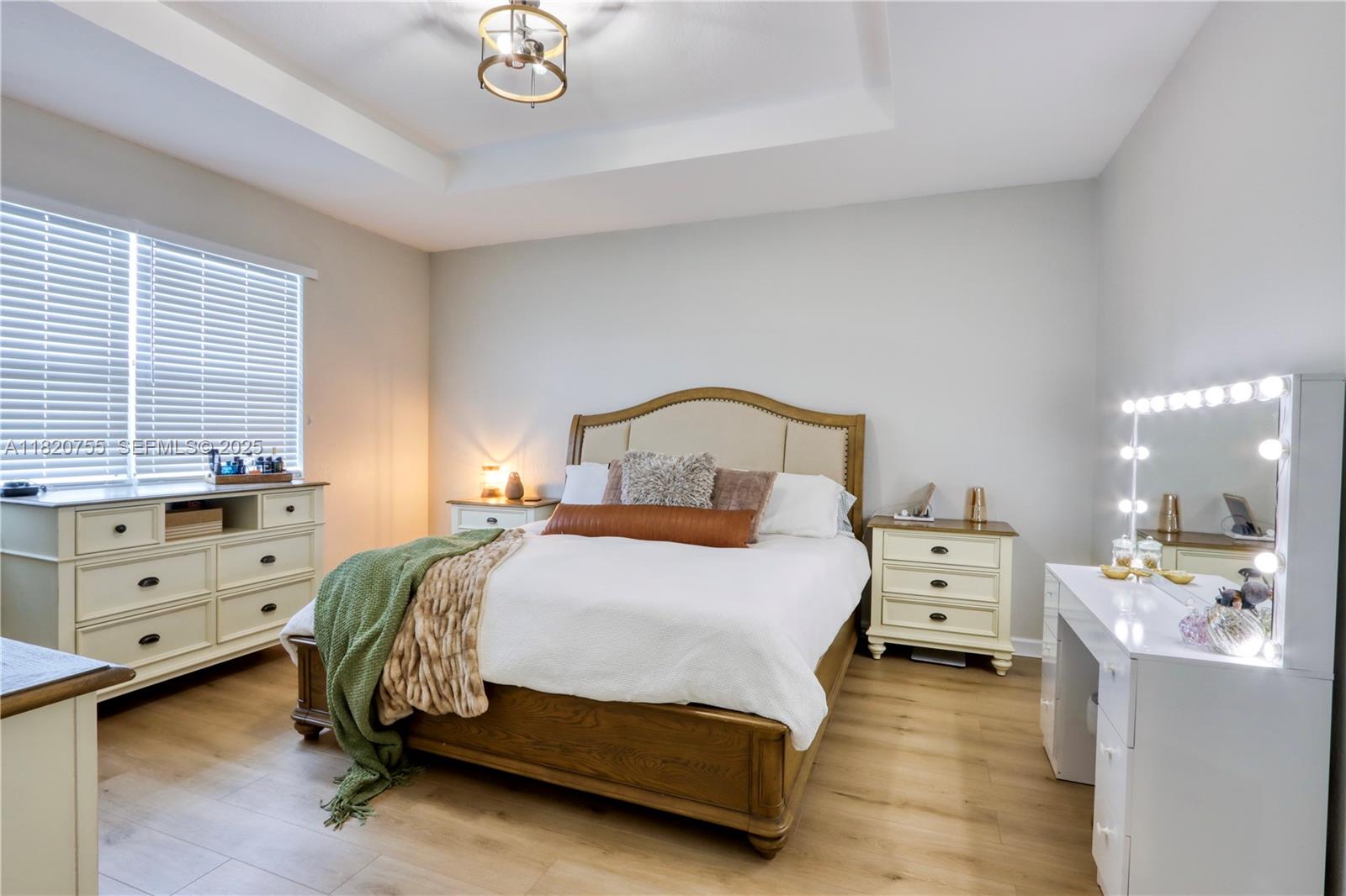 148 Northeast 36th Avenue Road Homestead, FL 33033 - Photo 30 of 53 a bedroom with a bed and a dresser