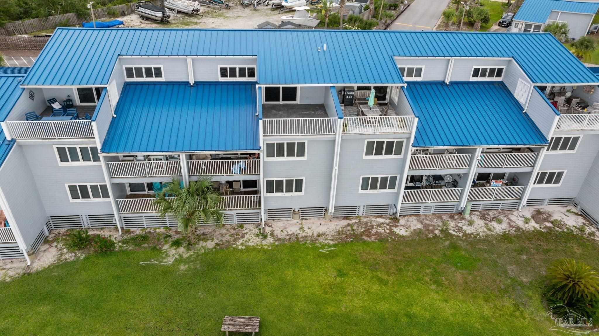 16470 Perdido Key Drive, Unit 33B Perdido Key, FL 32507 - Photo 1 of 32 a aerial view of a house with a yard