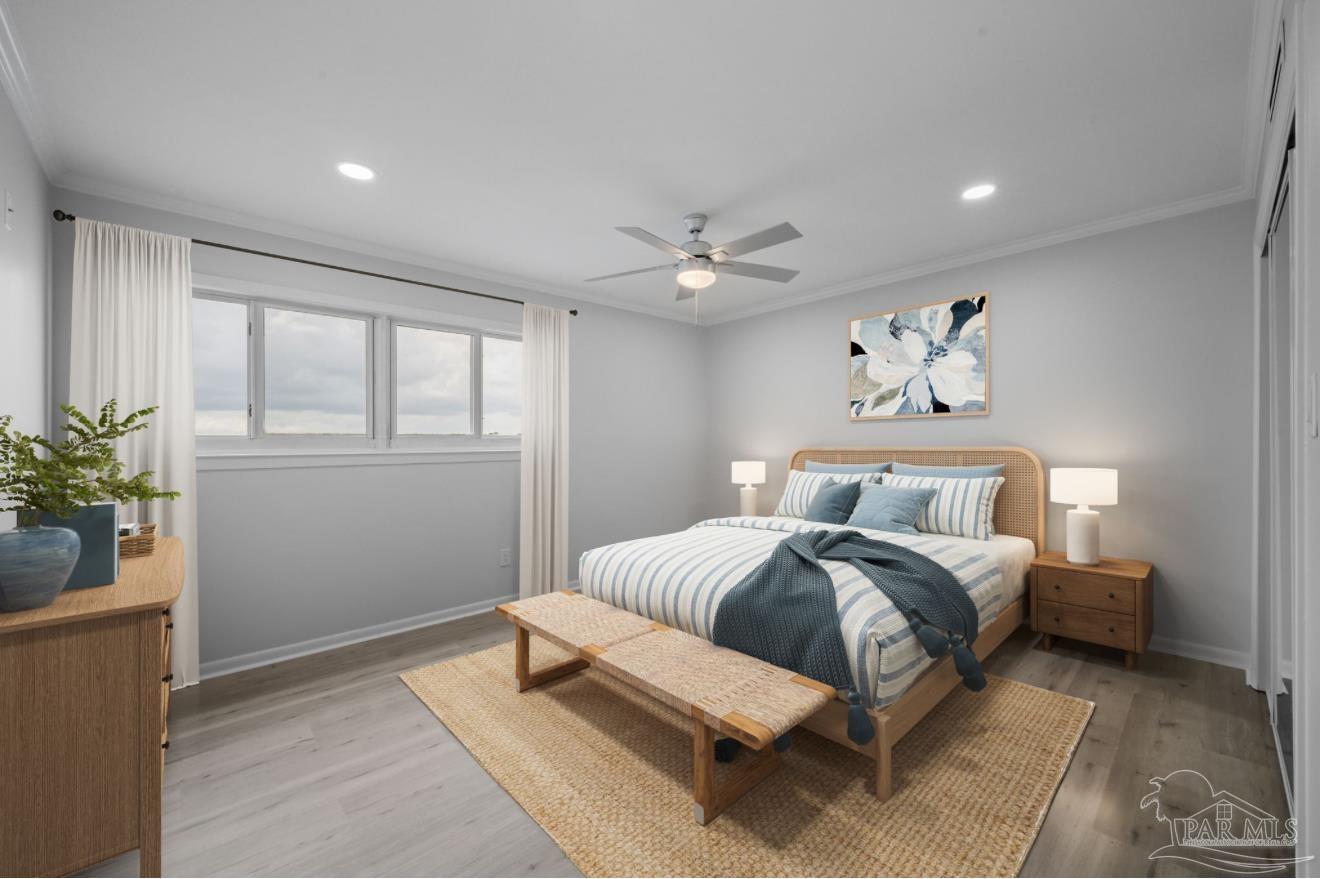 16470 Perdido Key Drive, Unit 33B Perdido Key, FL 32507 - Photo 14 of 32 a spacious bedroom with a bed and a window