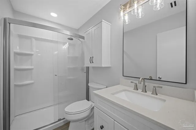 a park with tall buildings in the background