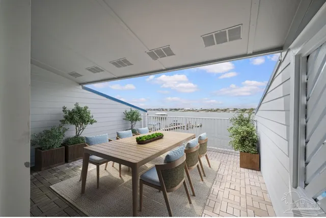 a view of a table and chairs in patio