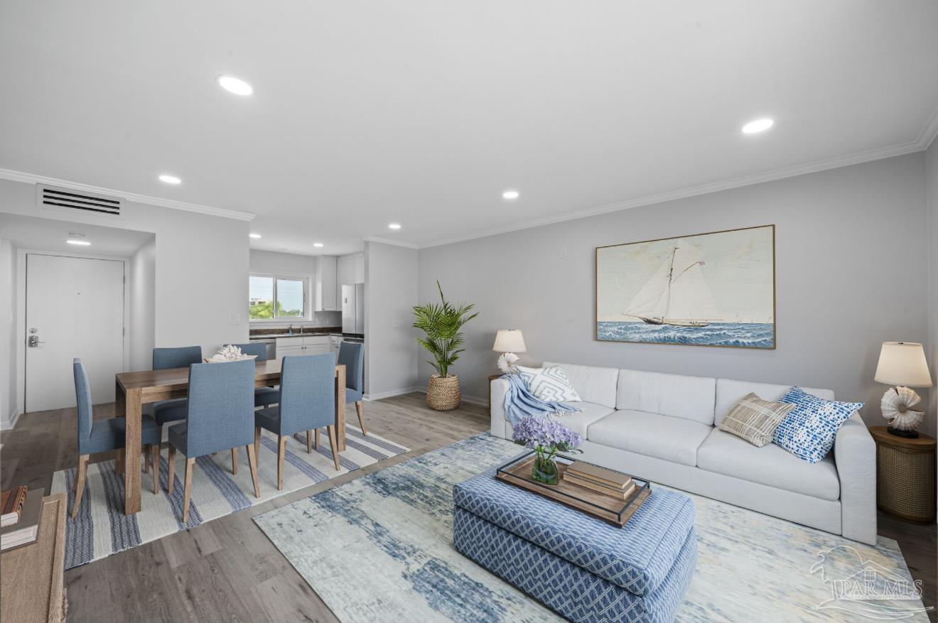 16470 Perdido Key Drive, Unit 33B Perdido Key, FL 32507 - Photo 10 of 32 a living room with furniture and wooden floor