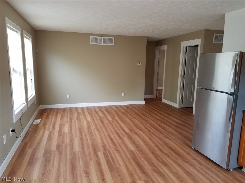 75 East Ohio Avenue Rittman, OH 44270 - Photo 6 of 17 From the Kitchen facing Dining room / family room