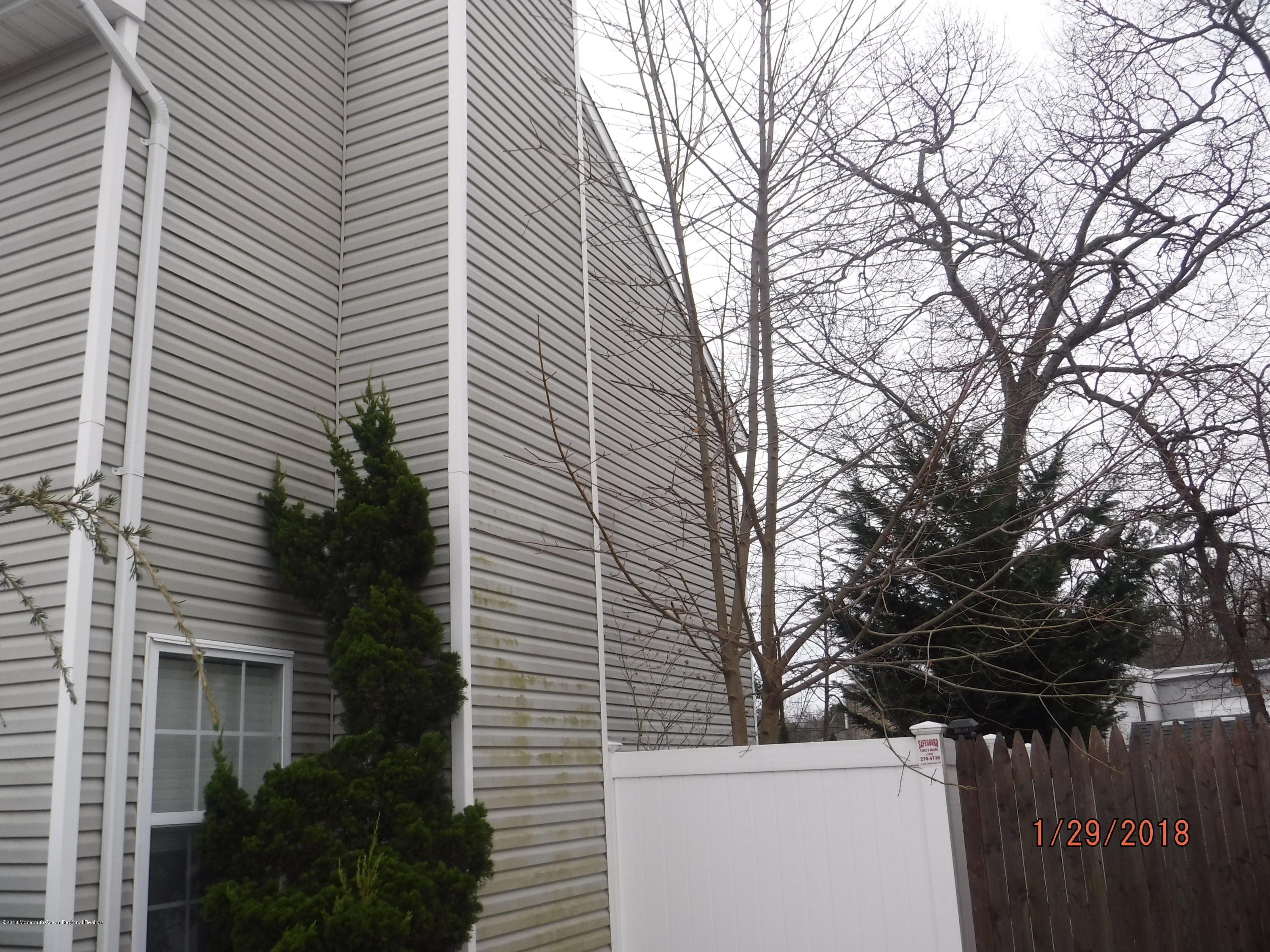 13 Sandy Point Drive Brick, NJ 08723 - Photo 14 of 14 right side