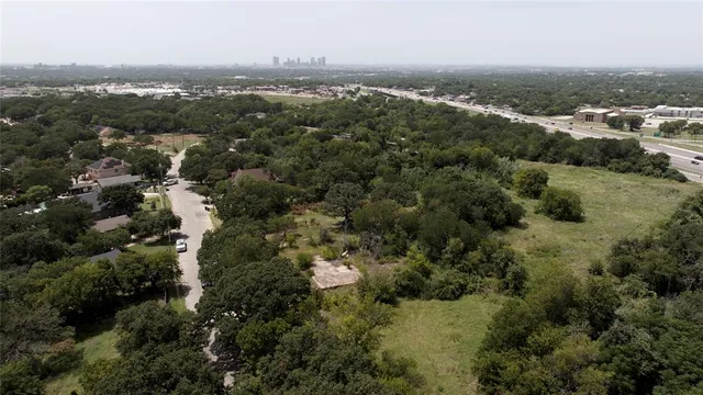 an aerial view of residential house with parking space