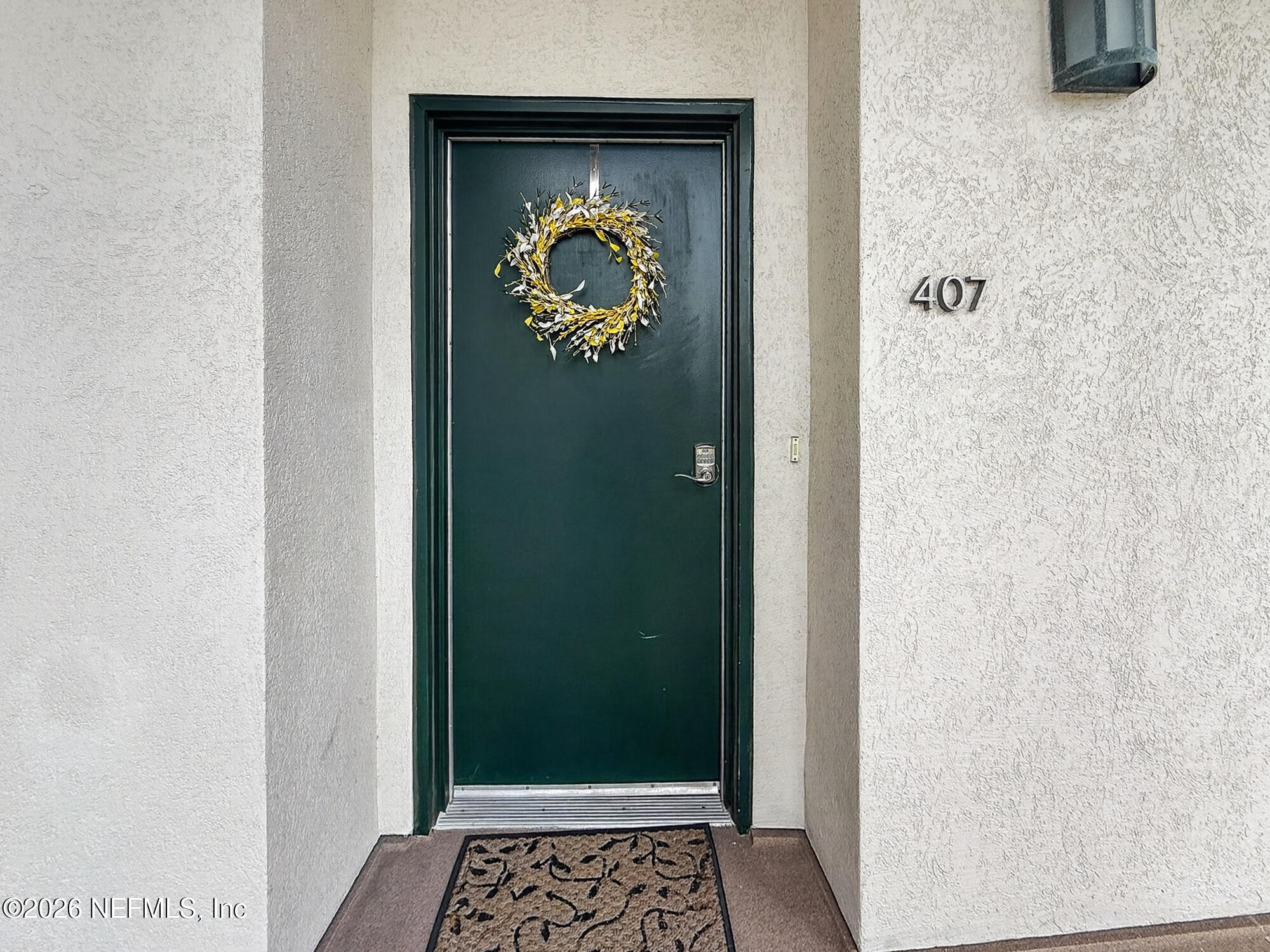1661 Riverside Avenue, Unit 407 Jacksonville, FL 32204 - Photo 2 of 60 a view of a hallway with wooden floor