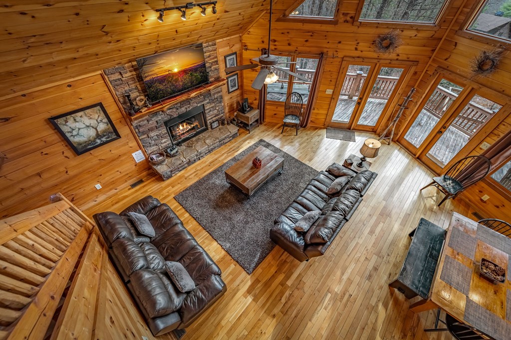 126 Sugar Mountain Road Blue Ridge, GA 30513 - Photo 22 of 78 a view of a backyard with sitting area