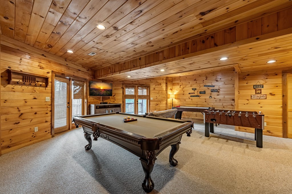 126 Sugar Mountain Road Blue Ridge, GA 30513 - Photo 24 of 78 a room with pool table furniture and windows