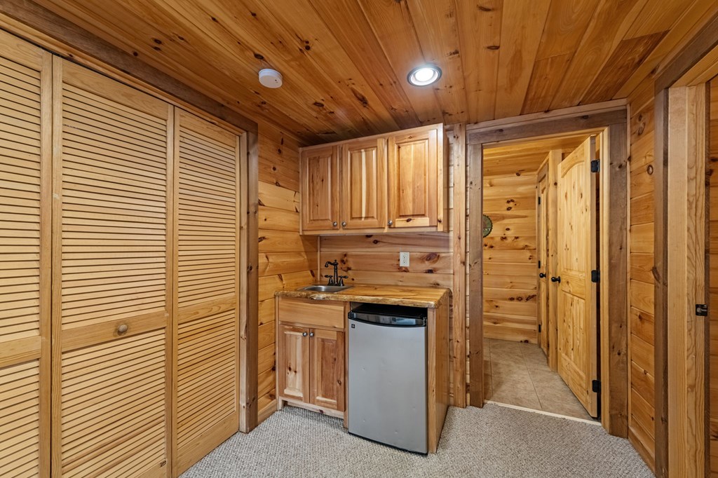 126 Sugar Mountain Road Blue Ridge, GA 30513 - Photo 25 of 78 a view of a kitchen with cabinets