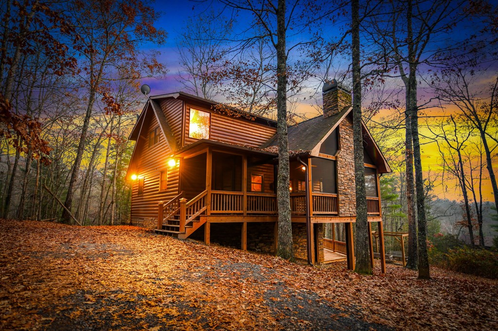 126 Sugar Mountain Road Blue Ridge, GA 30513 - Photo 76 of 78 a view of a house with a yard