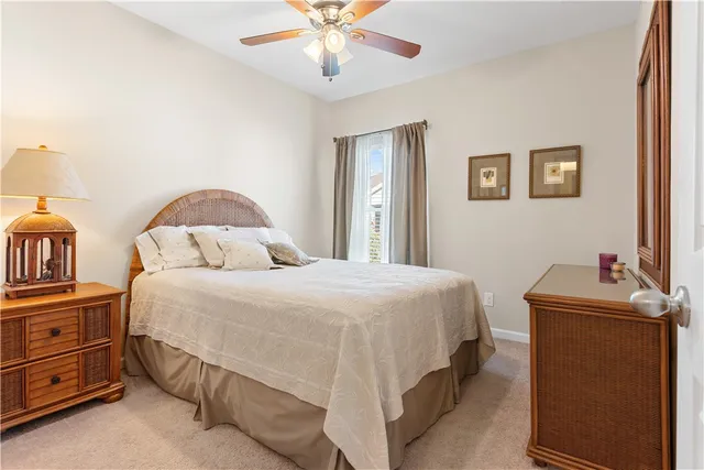 a view of a patio with table and chairs