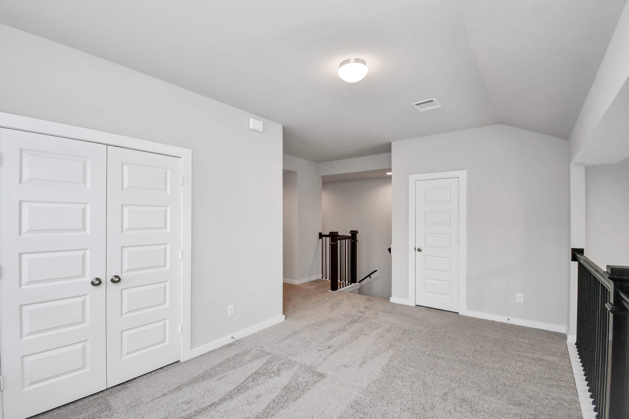 14606 Surfbird Lane Houston, TX 77049 - Photo 27 of 45 Come upstairs and enjoy a day of leisure in this fabulous game room! This is the perfect hangout spot or adult game room! Features plush carpet, high ceilings, custom paint and windows for plenty of natural light.