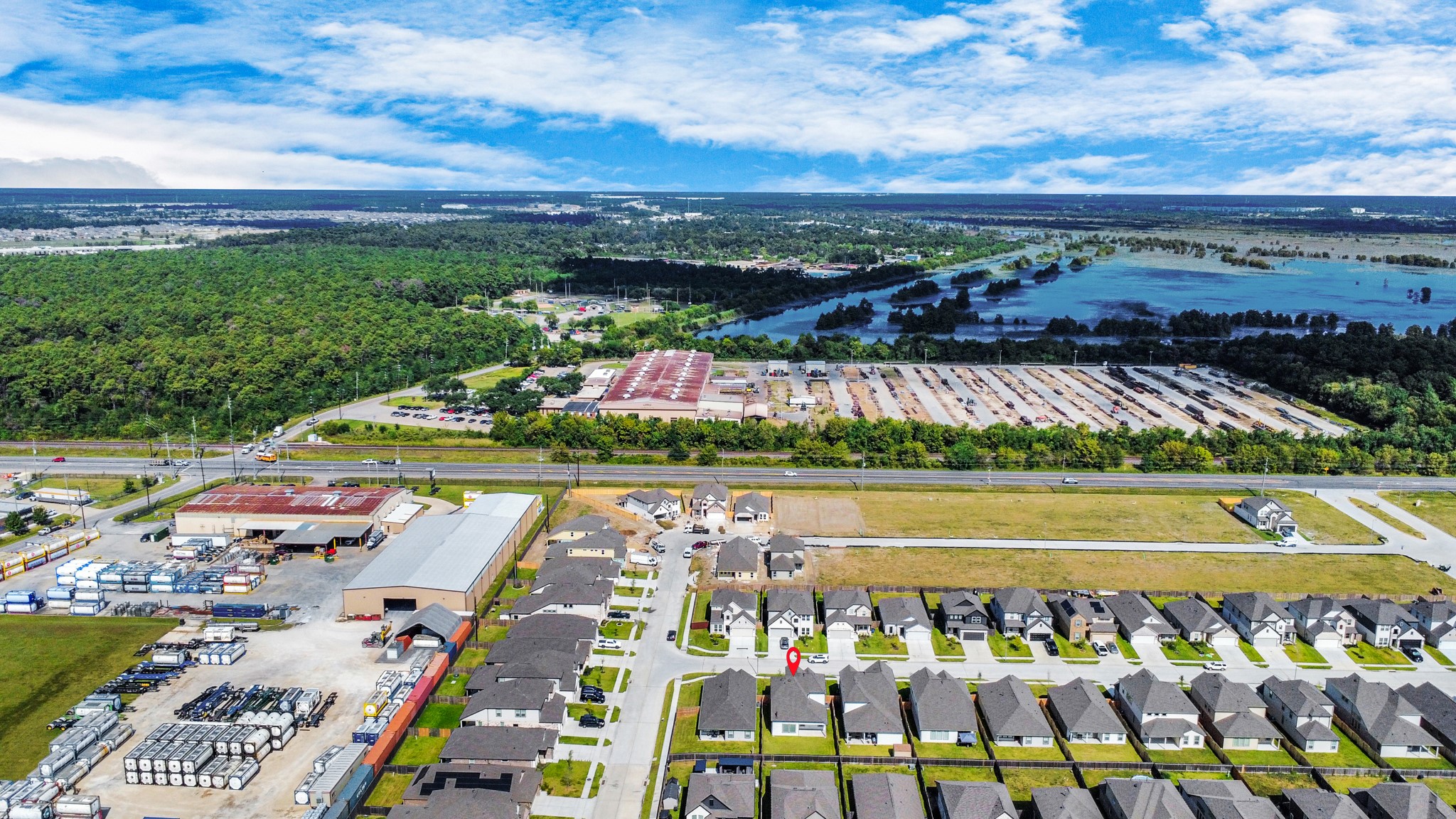 14606 Surfbird Lane Houston, TX 77049 - Photo 4 of 45 An aerial view of a spacious subdivision lot, highlighting a well-maintained yard and a fully fenced perimeter, offering both privacy and expansive outdoor space.